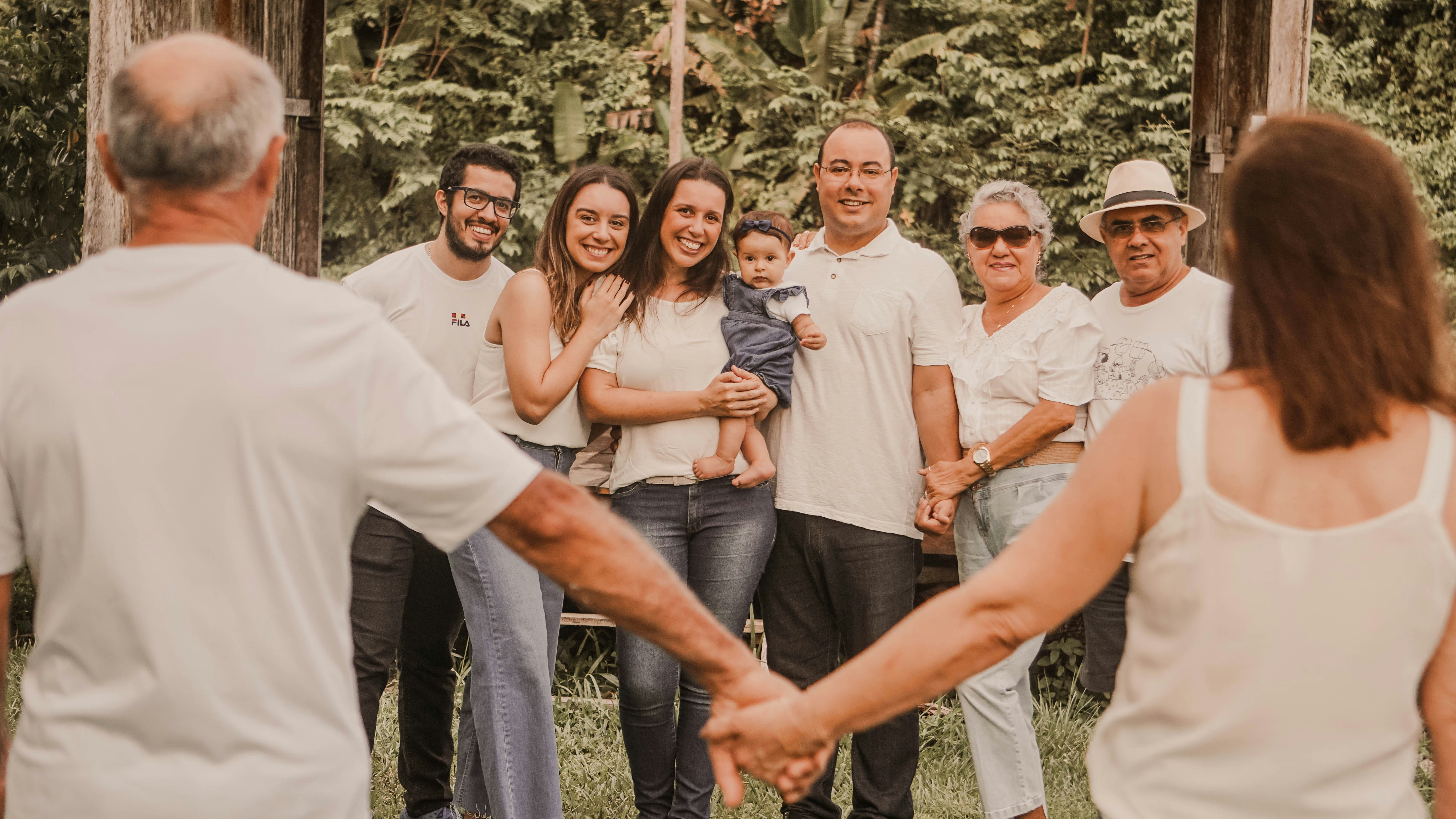A family across generations together in warm, natural light